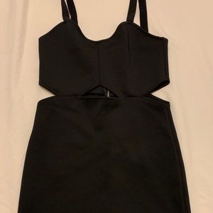 Mini black dress.